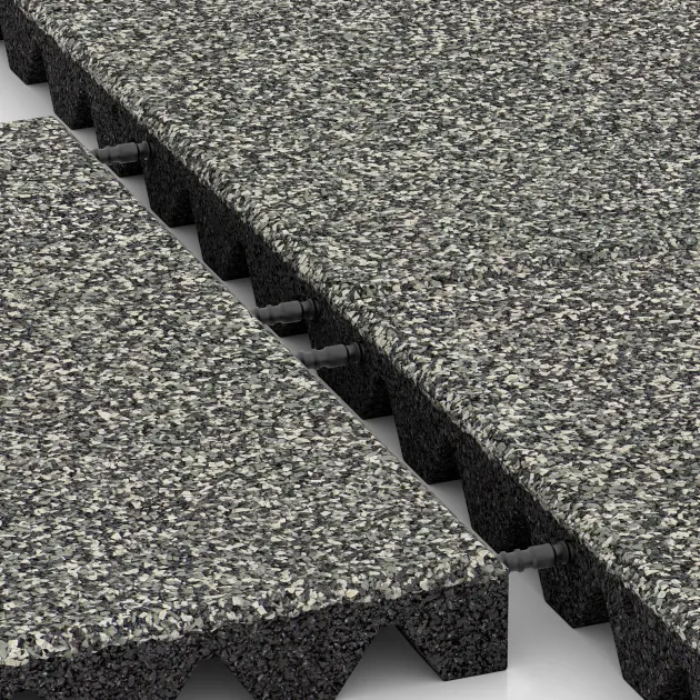 Großaufnahme vom Verbindungssystem von WARCO-Boden 5543 - Bezpečnostná gumová dlaždica na detské ihrisko 4,5 cm - EN 1177 ≤ 135 cm im Farbdesign Šedý granit. Abmessungen 500 x 500 x 45 mm.