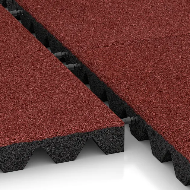 Großaufnahme vom Verbindungssystem von WARCO-Boden 0630 - Dopadová gumená podložka na ihrisko im Farbdesign Korálová červená. Abmessungen 500 x 500 x 45 mm.