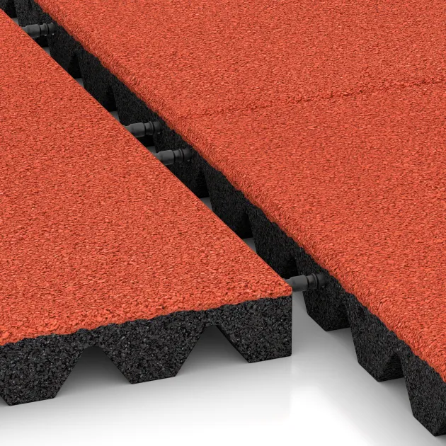 Großaufnahme vom Verbindungssystem von WARCO-Boden 0638 - Dopadová gumená podložka na ihrisko im Farbdesign Svetlooranžová červená. Abmessungen 500 x 500 x 45 mm.