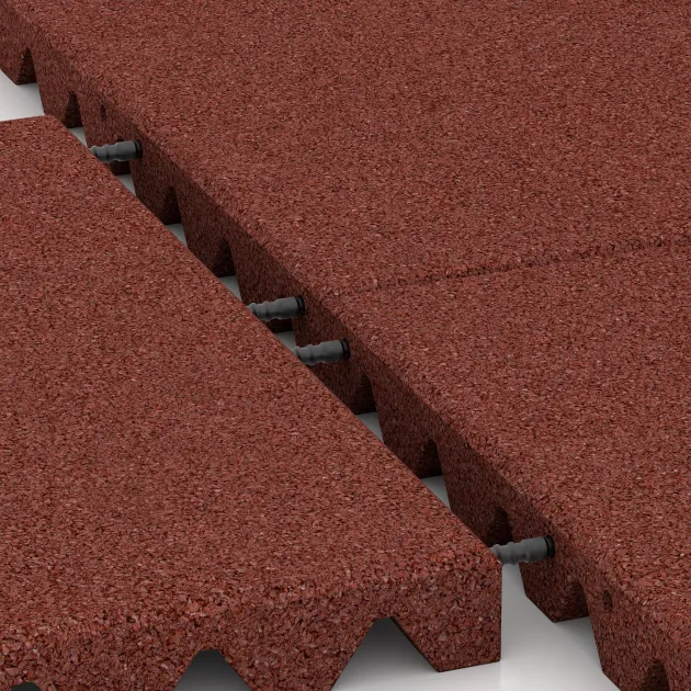 Großaufnahme vom Verbindungssystem von WARCO-Boden 0655 - Ochranná stenová doska im Farbdesign Cihlovo červená. Abmessungen 500 x 500 x 45 mm.
