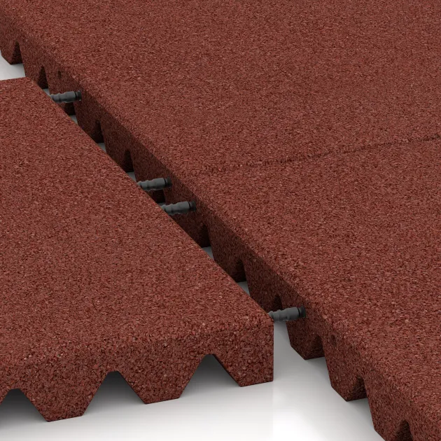 Großaufnahme vom Verbindungssystem von WARCO-Boden 0691 - Dopadová gumená podložka na ihrisko im Farbdesign Cihlovo červená. Abmessungen 500 x 500 x 50 mm.