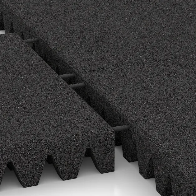 Großaufnahme vom Verbindungssystem von WARCO-Boden 0726 - Dopadová gumená podložka na ihrisko im Farbdesign Antracit. Abmessungen 500 x 500 x 80 mm.