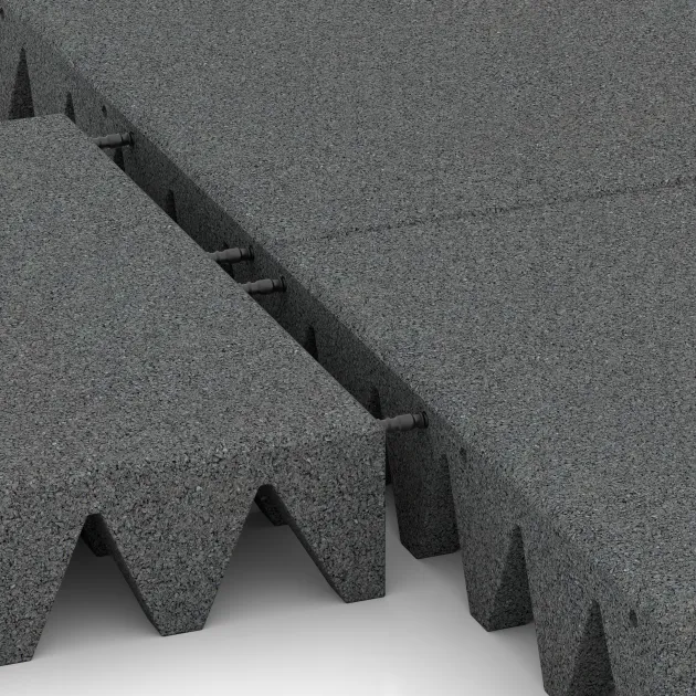 Großaufnahme vom Verbindungssystem von WARCO-Boden 0747 - Dopadová gumená podložka na ihrisko im Farbdesign Šedý bridlica. Abmessungen 500 x 500 x 100 mm.