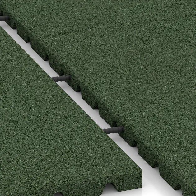 Großaufnahme vom Verbindungssystem von WARCO-Boden 3997 - Gumená podlahová doska pre psy im Farbdesign Trávová zelená. Abmessungen 1000 x 1000 x 30 mm.