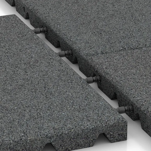 Großaufnahme vom Verbindungssystem von WARCO-Boden 0523 - Dopadová gumená podložka na ihrisko im Farbdesign Šedý bridlica. Abmessungen 400 x 400 x 30 mm.