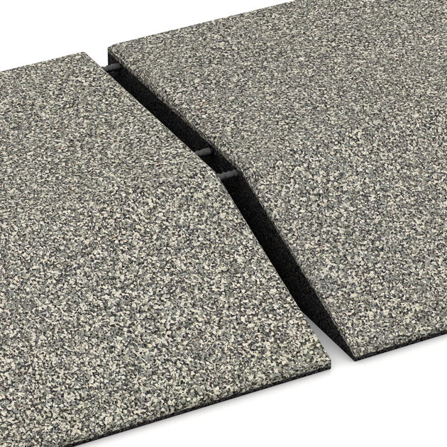 Großaufnahme vom Verbindungssystem von WARCO-Boden 3830 - Corner tile (two chamfered sides) im Farbdesign Svetlý granit. Abmessungen 500 x 500 x 100 mm.