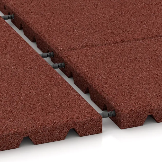 Großaufnahme vom Verbindungssystem von WARCO-Boden 0378 - Half tile im Farbdesign Cihlovo červená. Abmessungen 500 x 250 x 30 mm.