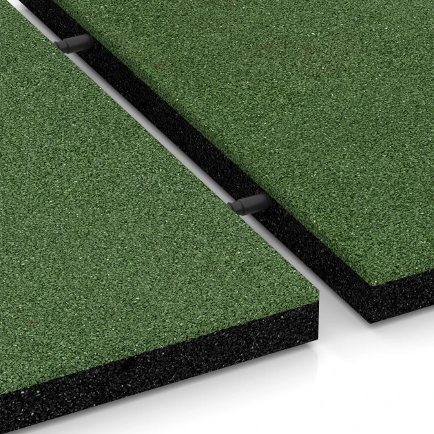 Großaufnahme vom Verbindungssystem von WARCO-Boden 6195 - Dopadové dosky im Farbdesign Trávovo zelená. Abmessungen 50 x 50 x 4 cm.