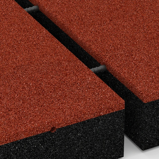 Großaufnahme vom Verbindungssystem von WARCO-Boden 6278 - Dopadová dlaždica – 300 cm im Farbdesign Cihlová červená. Abmessungen 50 x 50 x 11 cm.